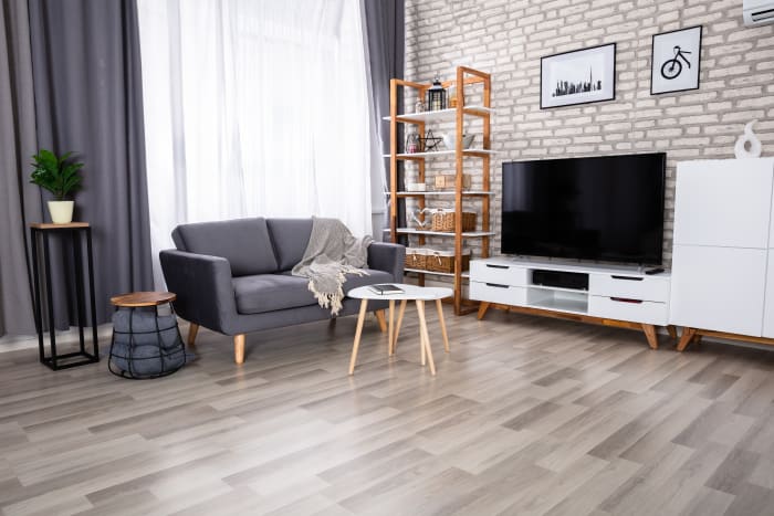 gray luxury vinyl plank flooring (LVP) in a living room